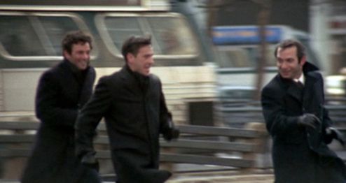 Peter Falk, John Cassavetes, Ben Gazzara, running in black wool coats in the movie Husbands