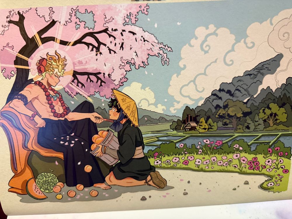 A picture from a calendar showing Katsuki Bakugo as some sort of deity, with Izuku Midoriya as a peasant kneeling before him holding a basket of fruit. Some of the fruit has fallen from the basket, and is landing at Bakugo's feet. There is a cherry blossom tree behind Katsuki and some petals have landed on his lap as he uses his folded fan (?) to raise Izuku's chin to make him look at him. The background looks to be a traditional Japanese landscape with Rice Patties, flowers, trees and hills and a cloud filled sky.