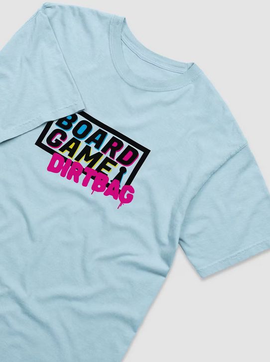 a light teal shirt that says board game dirtbag