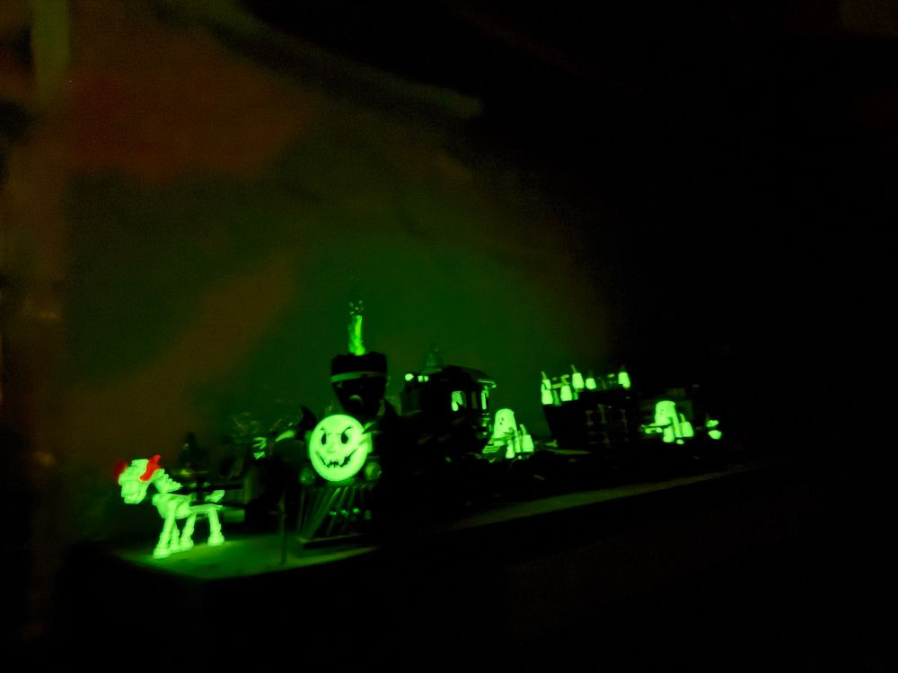 Terrifying Lego ghost train racing a mummy’s chariot pulled by a skeleton horse with flaming eyes.  Lots of glow-in-the-dark parts. 