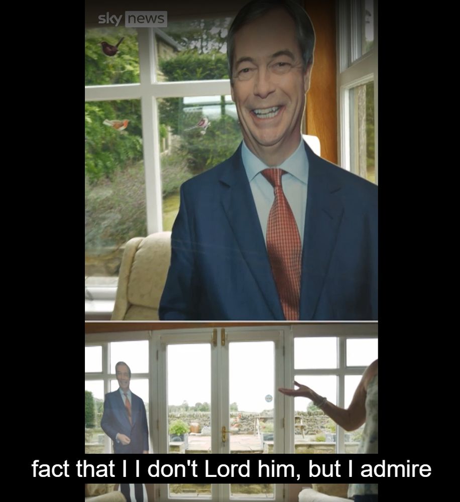 screen shot from an interview with a ring wing woman showing a cardboard cut out of farage in her living room