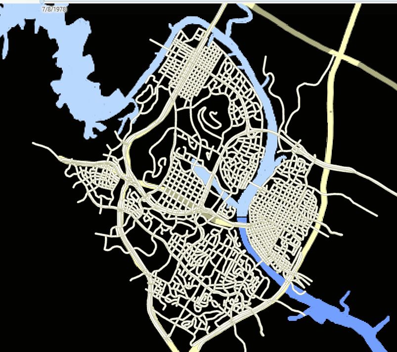 screenshot of a GIS program, with street centerlines and a georeferenced image in the background