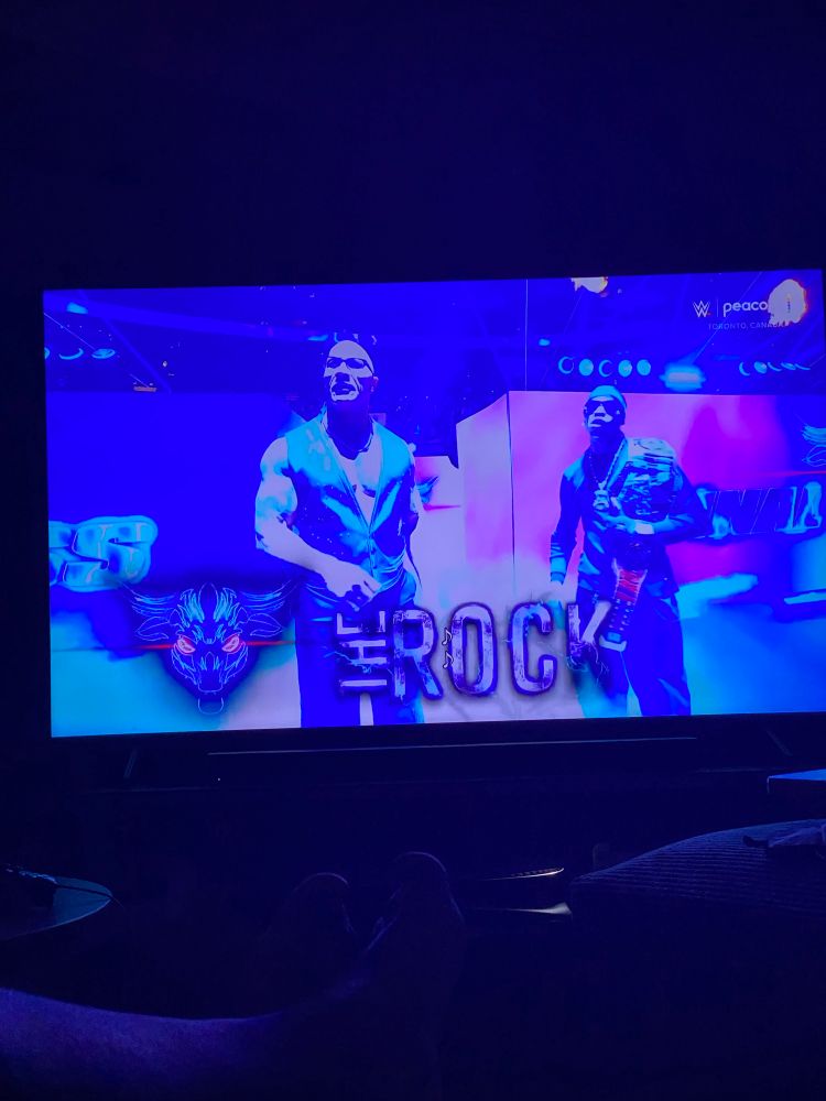 The Rock showing up at the Elimination Chamber.