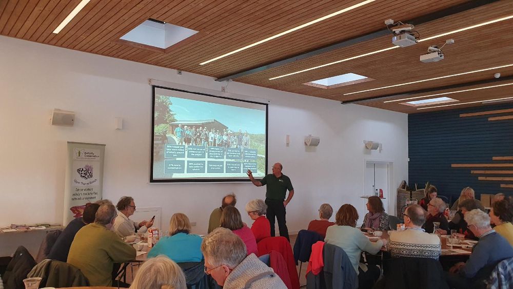 A man giving a presentation to a group of people.