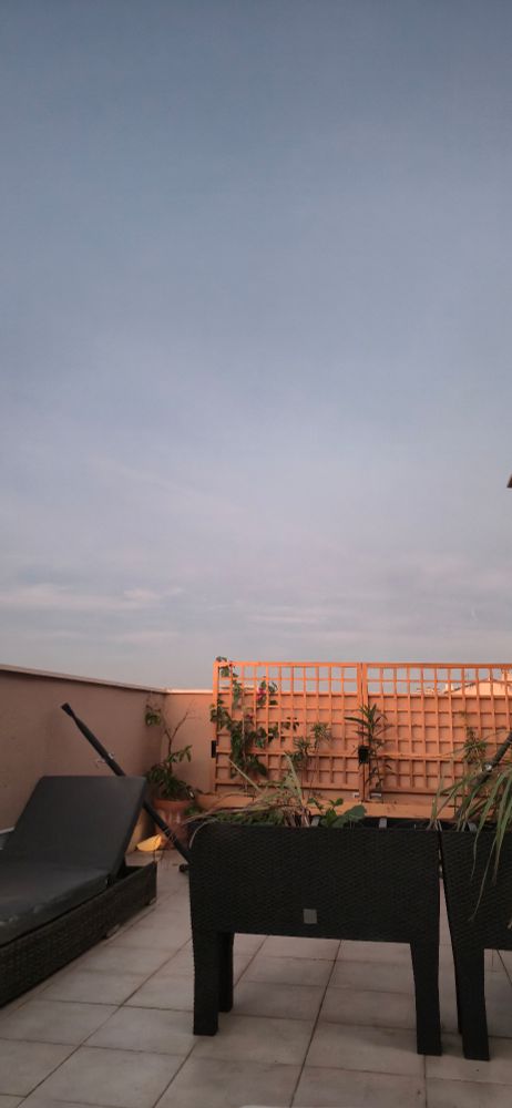 Murcian balcony bathing in the light of the setting sun. It feels cozy yet like the beginning of the winter