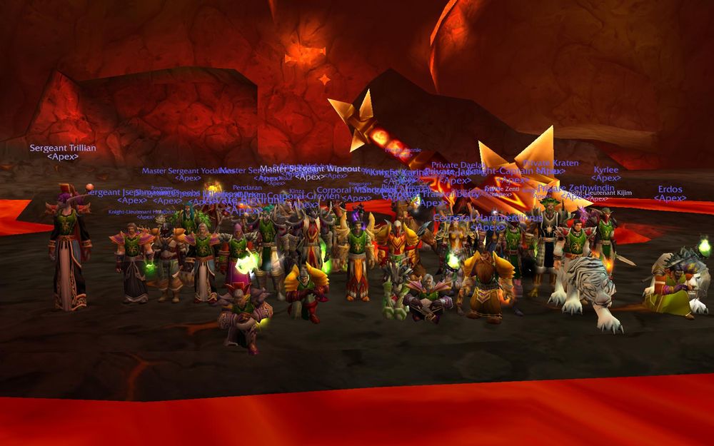 A screenshot showing a raiding guild after defeating Ragnaros in the Molten Core raid dungeon of World of Warcraft (2004).