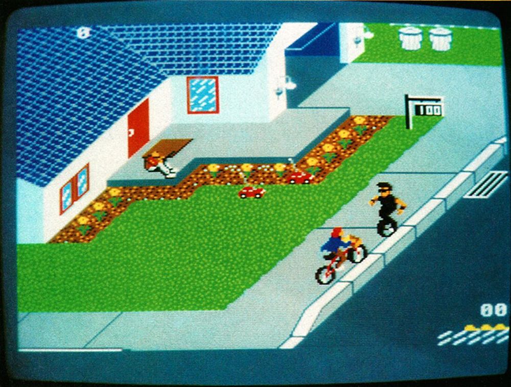 A screen photograph of the game Paperboy (1985).