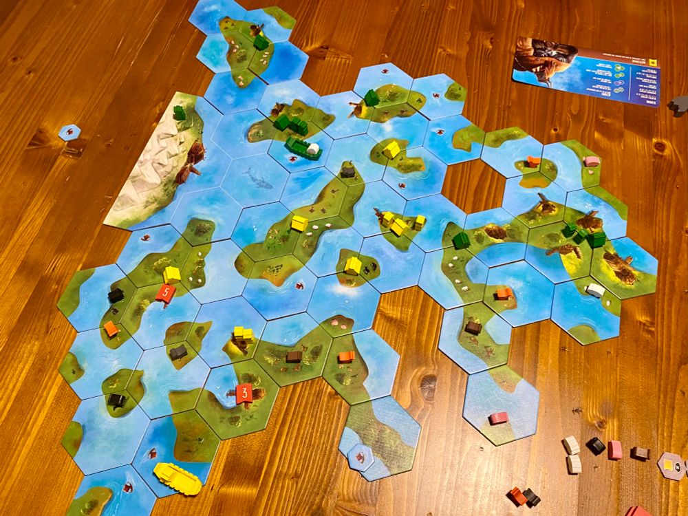The tiles from Explorers of the North Sea set up on a table, showing the game in progress. 