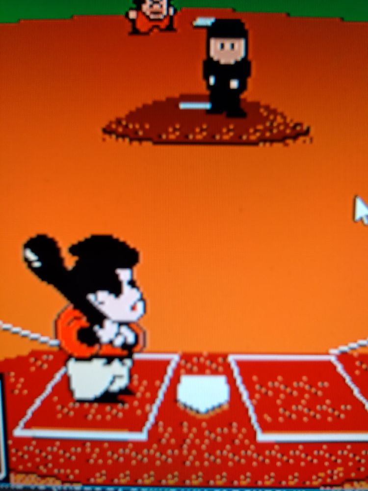 A batter for Goemontai facing off against the Kurokotai pitcher.