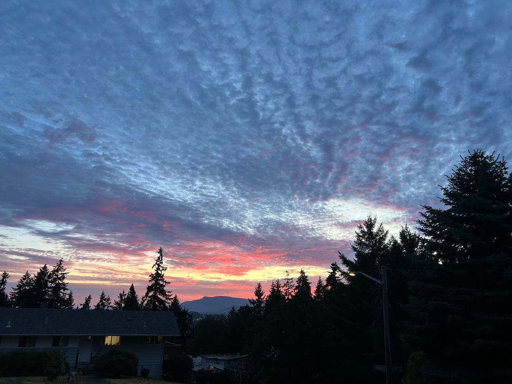 Sunrise with partly cloudy sky 