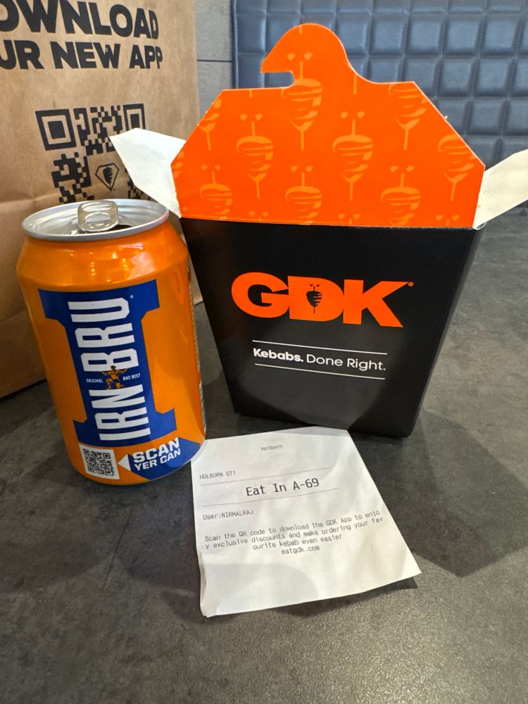 A can of Irn-Bru, a Döner box, and a receipt, all on a table in GDK - German Döner Kitchen