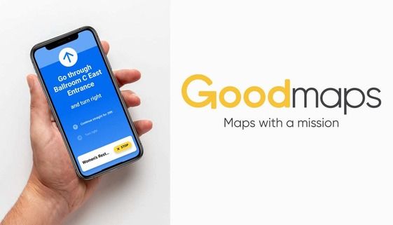 A person holding a smartphone displaying the GoodMaps navigation app with directions on the screen, next to the GoodMaps logo with the tagline "Maps with a mission."