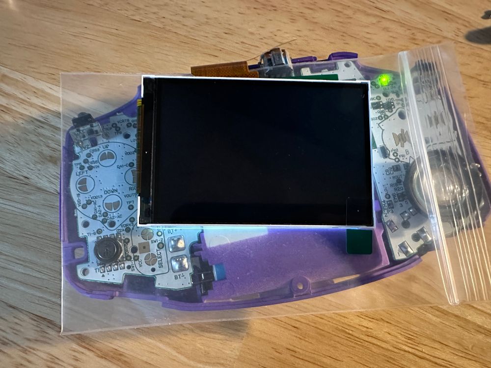 A sad Game Boy Advance with nonfunctional IPS LCD because I’m a goddamned cheapskate.