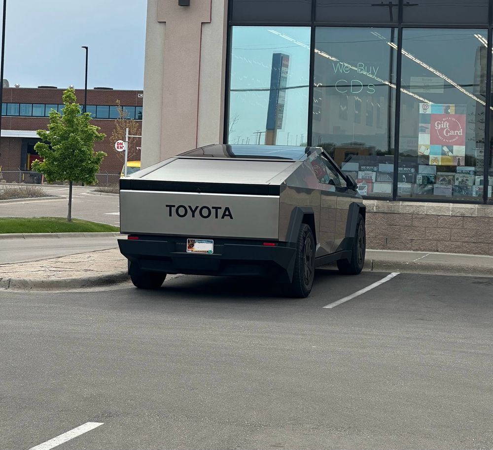 A dumpster that wishes it were a DeLorean with a big Toyota badge on the back. Not fooling anyone buddy