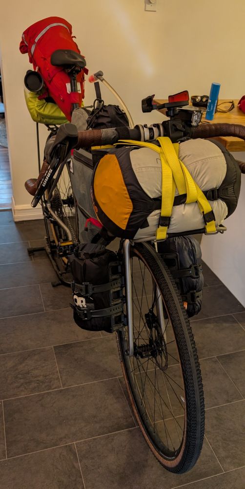 Front view of bike loaded with camping gear and bags for a few days of touring. 