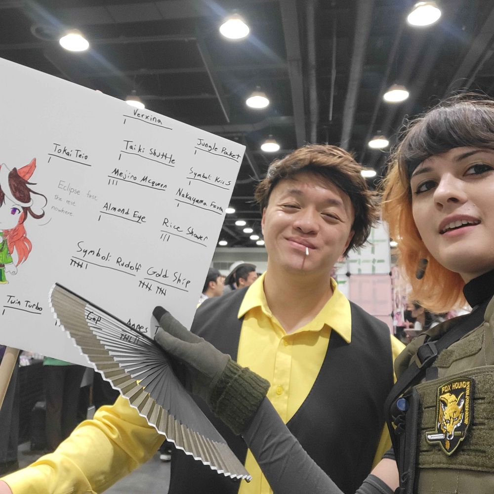 me in a meryl silverburgh cosplay with trainer-san, having just voted for golshi