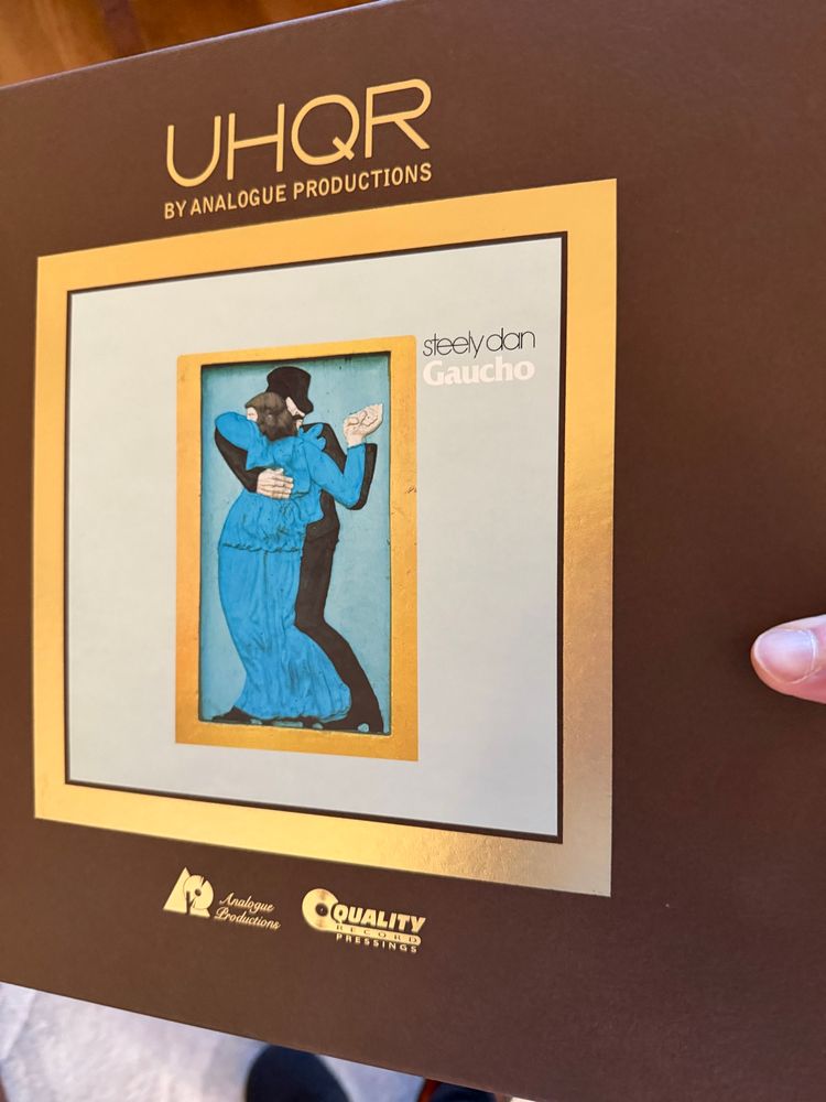 My thumb holding Gaucho UHQR box set