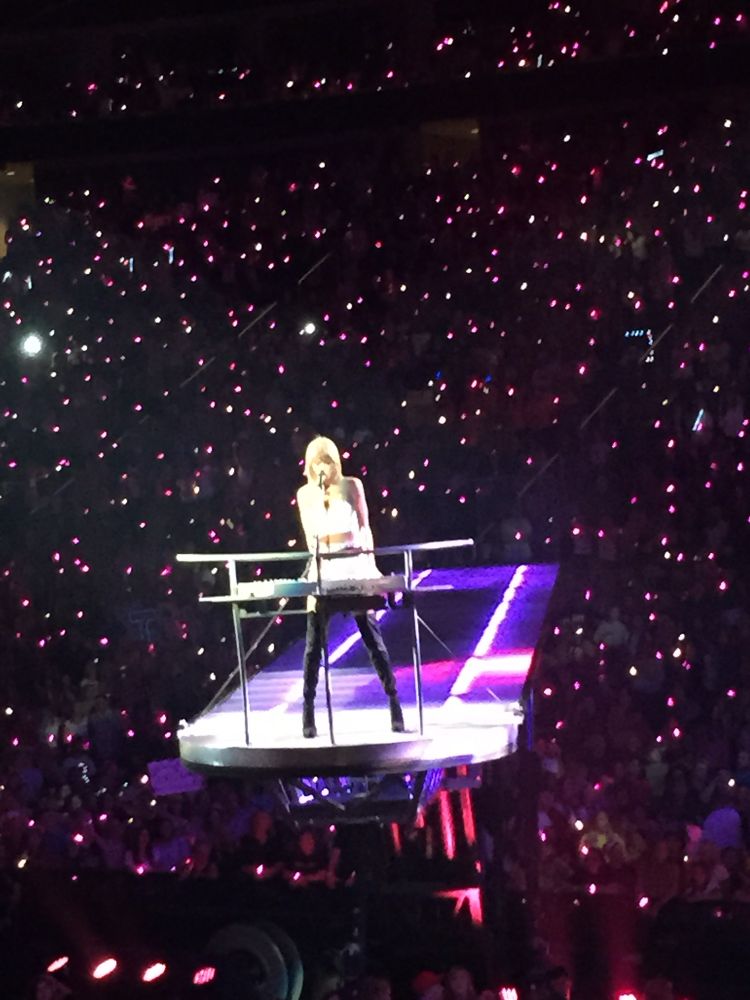 Picture of Taylor on a raised stage above the crowd during that Salt Lake City show. 