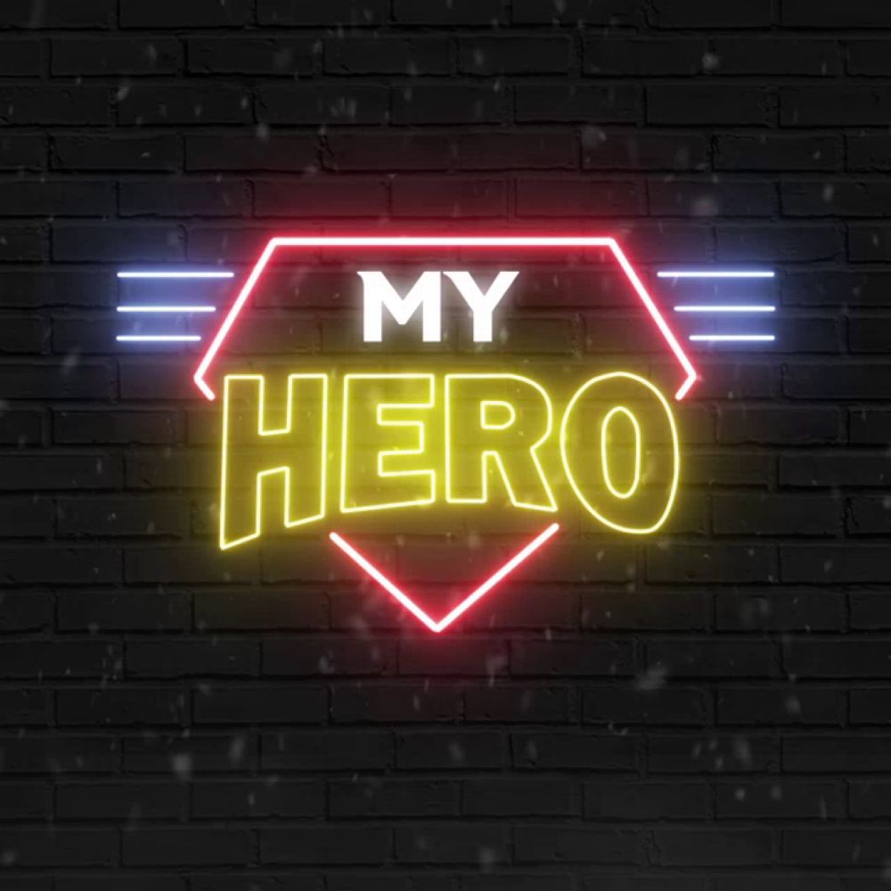 a neon sign on a brick wall says my hero