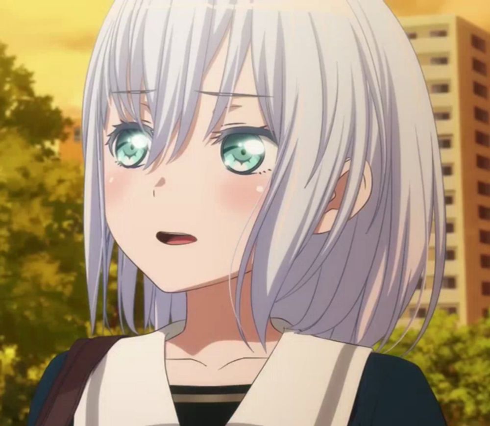 a girl with white hair and blue eyes is looking at something