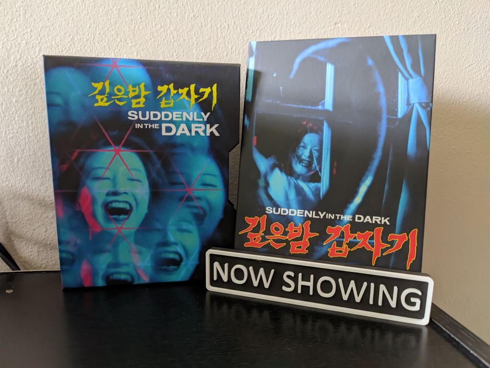 Suddenly in the dark with box and slipcover