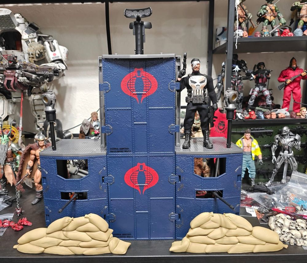 GI Joe classified base made from two of the defense post sets is two stories and three plates wide.