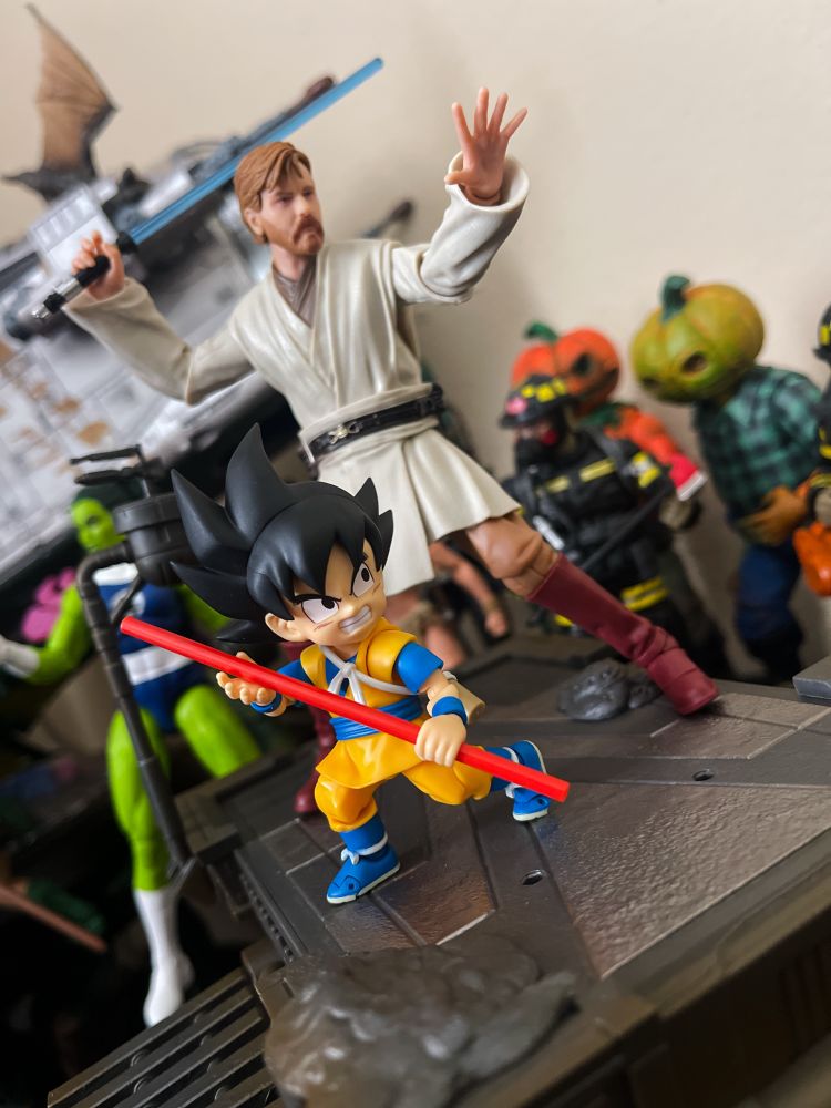 Tiny Goku dragonball figure pose with Black Series Obi-Wan.