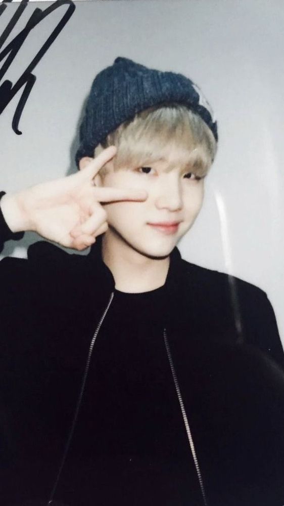 yoonhi in beanie wearing back, posing for camera