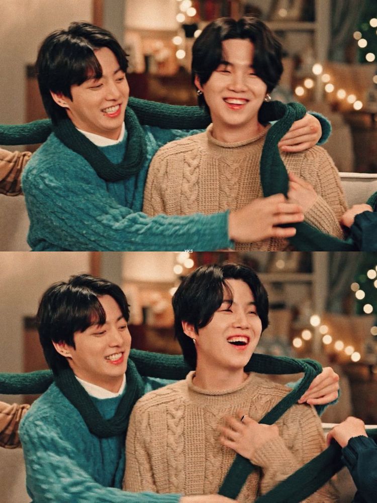 JK and Yoongi sharing one scarf (its actually ot7 but the photo was cropped and it's from a gum commercial!)