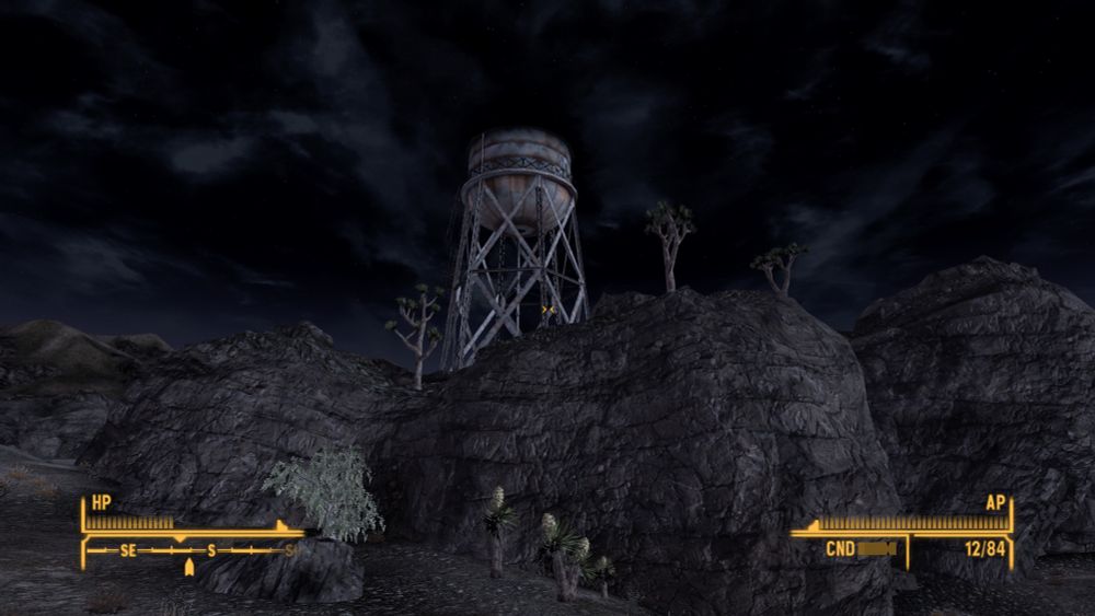 A picture of a water tower on a ridge from the game fallout New Vegas 