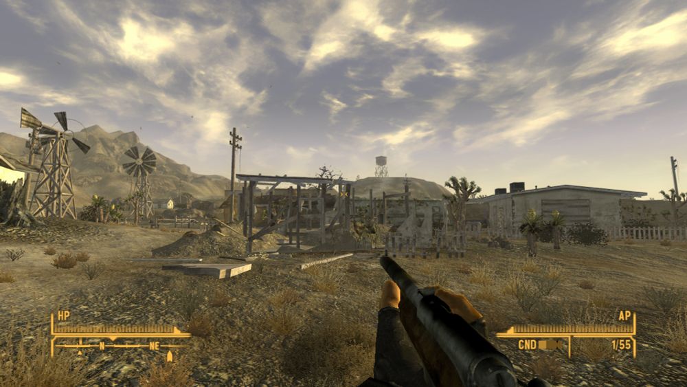 A shot of ruined house and intact windmill from fallout New Vegas 