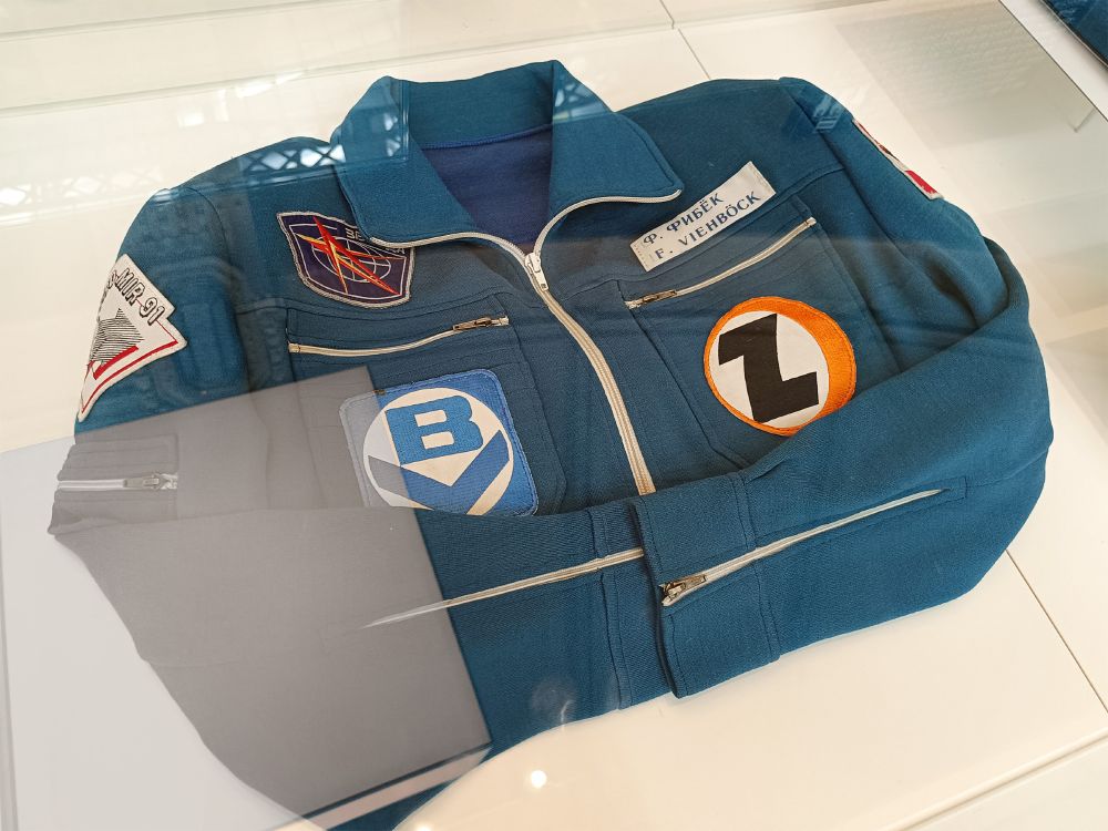 Viehböcks space station suit now in a museum, with the logos of the companies Bundeländerversicherung and Zentralsparkasse on his chest. 