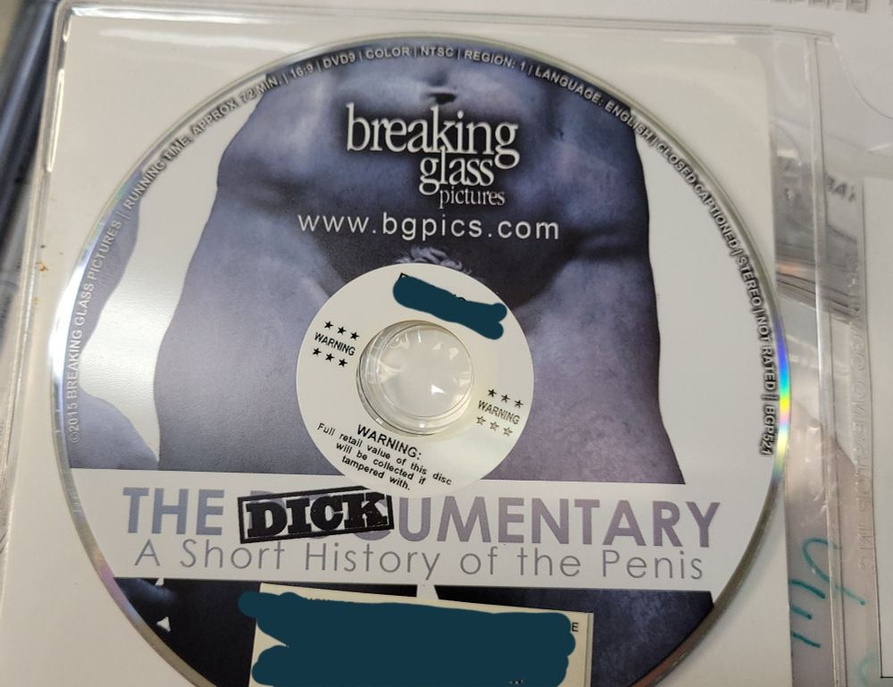 DVD of "The Dickumentary: A Short History of the Penis". The disc art is of a statuesque male torso and legs, with the center hole of the disc located where the main event (presumably) is