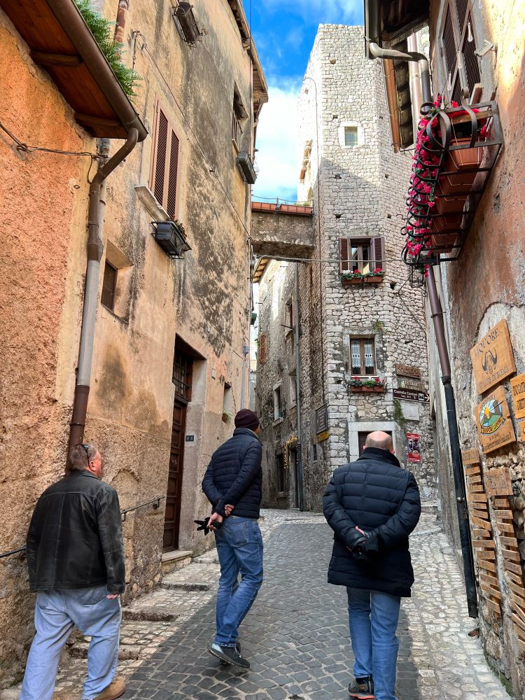 Walking up a narrow medieval street
