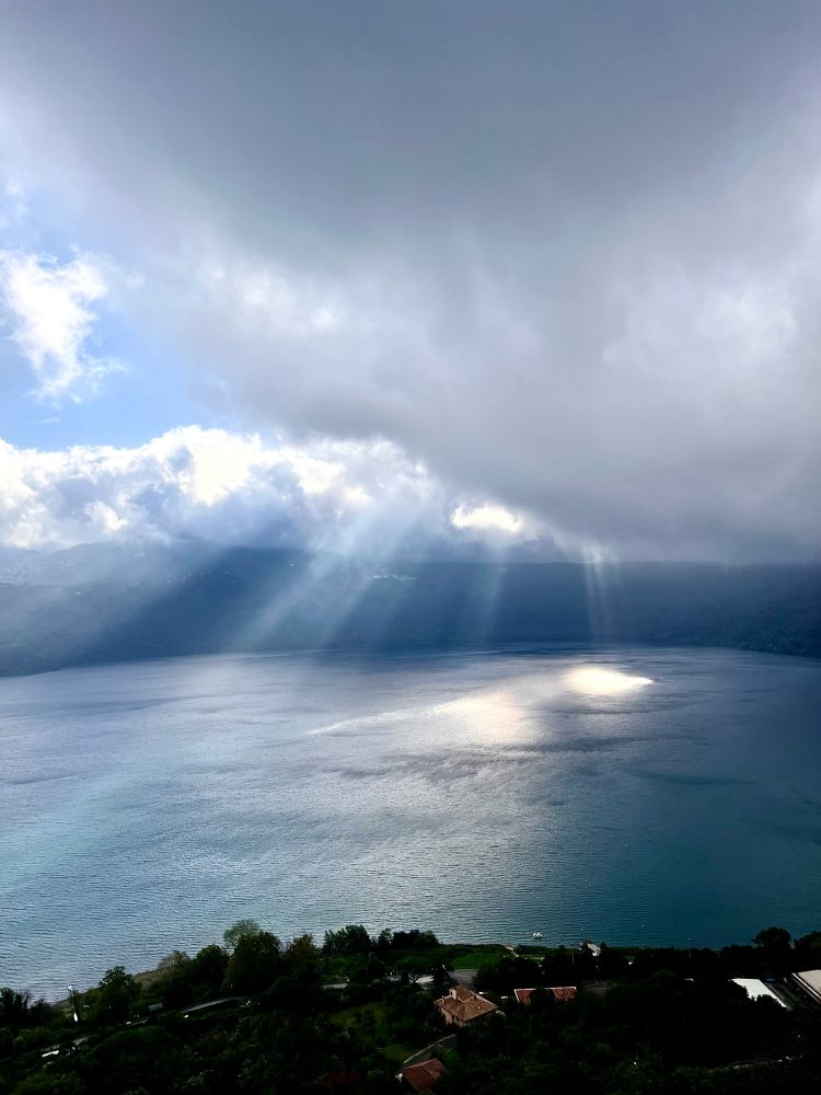 Rams of sunlight on Lake Albano near the Vatican Observatory telescopes south of Rome