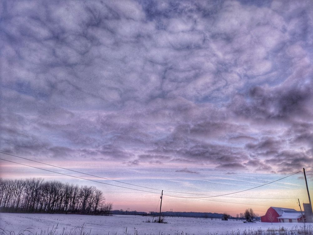 Sun rise over a snow landscape 