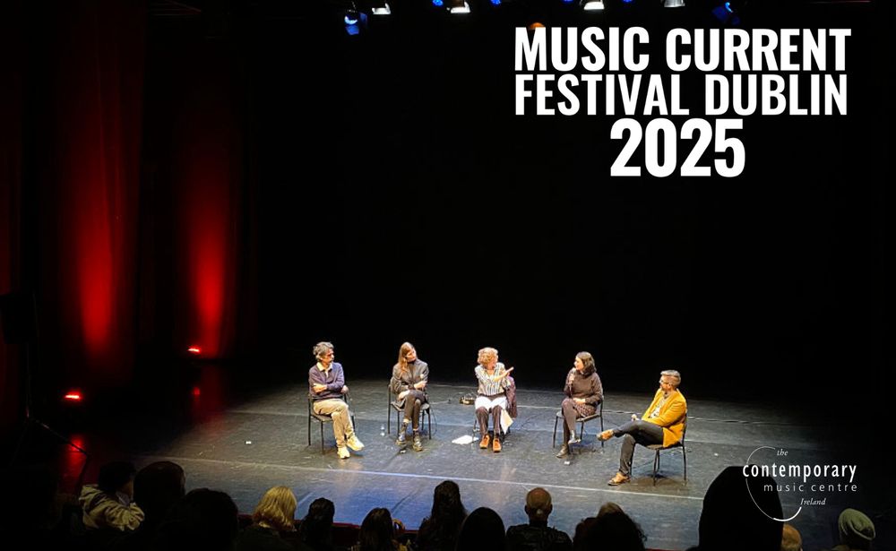 A panel discussion on stage at Project Arts Centre.