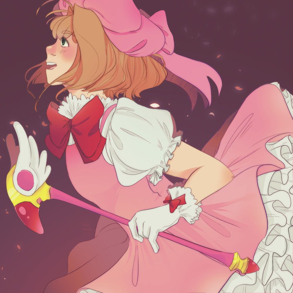 Sakura kinomoto in her popular pink ruffle dress and hat while holding her original bird shape staff.