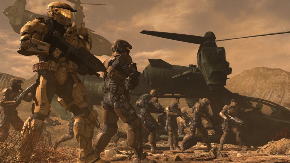 A Mark IV Spartan stands by while Falcons deploy Marines around them