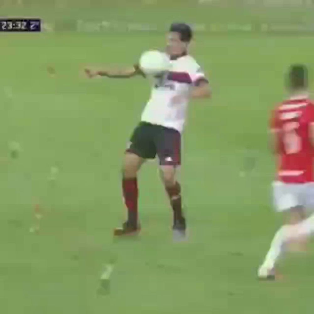 a group of soccer players are playing on a field and one of them is wearing a jersey that says ' united '