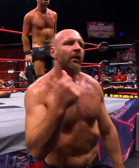 Mox makes makes hand gestures while Danny Garcia strips in the background. #HipDents