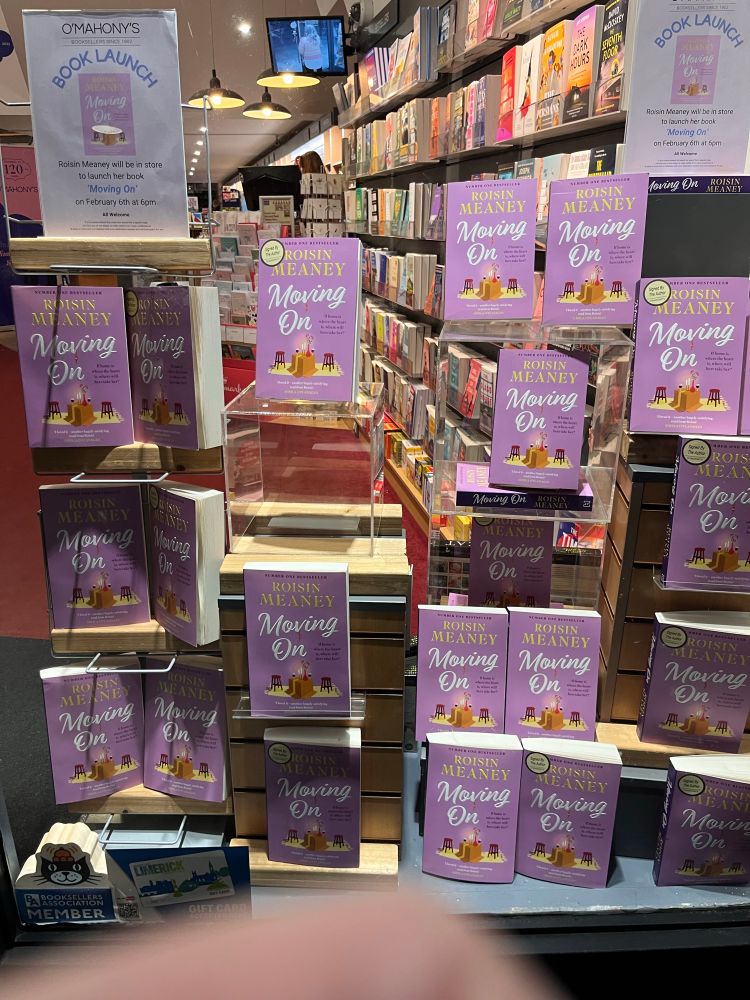 Copies of Roisin’s new book, Moving On, filling the shop window in O’Mahonys Bookshop, Limerick 