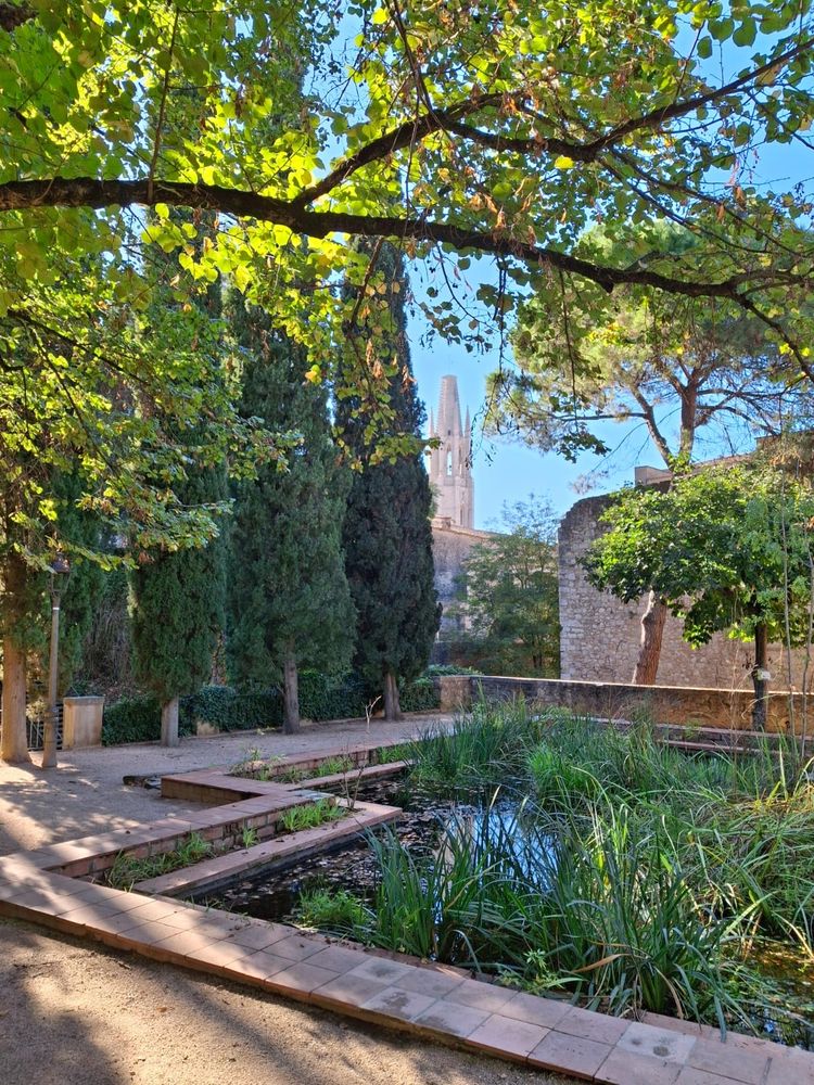 Green gardens in a medieval building in Girona, Spain