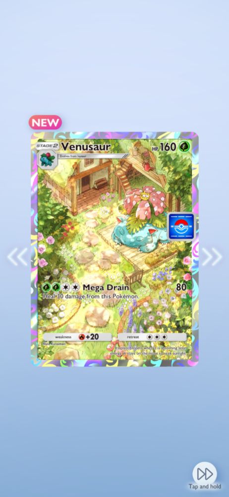 A screenshot of Pokémon TCG Pocket of the new full art Venusaur card. The art features a Venusaur sleeping peacefully near a beautiful flower and nature filled cottage in the woods. A stone path leads to the door through blooming bushes with pink flowers, and Venusaur sleeps on a wooden deck in the sun. 