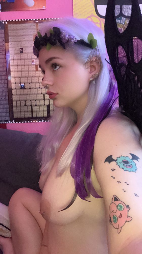 Luna with her tits out dresses as a fairy showing her side profile 