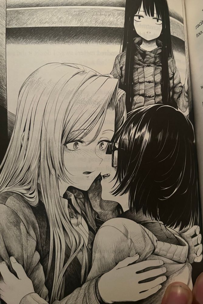 Sorawo whispering into Toriko's ear in a low voice as they hold each other, unaware Kasumi is standing in the background, looking at them emotionless.