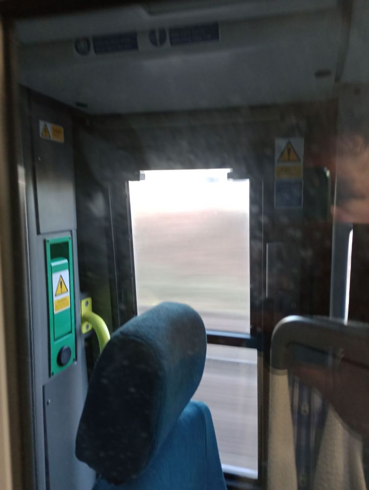 View through driver's window, as standing between two combined trains