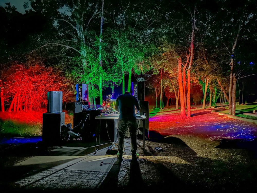 Stumbling upon a massive soundsystem and lighting rig in the woods.