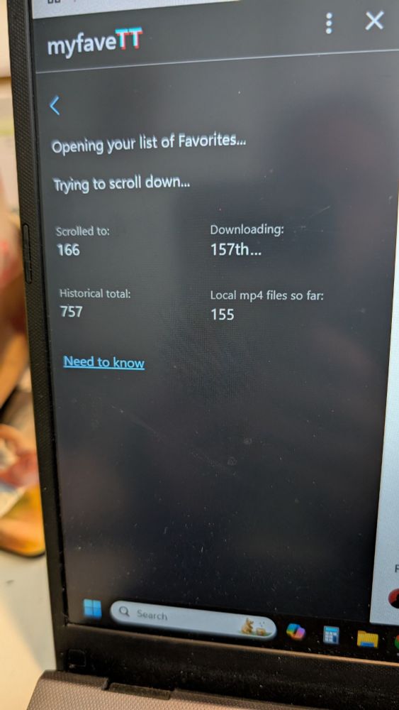 An image of a computer screen showing 157 out of 757 downloaded so far from TikTok. 