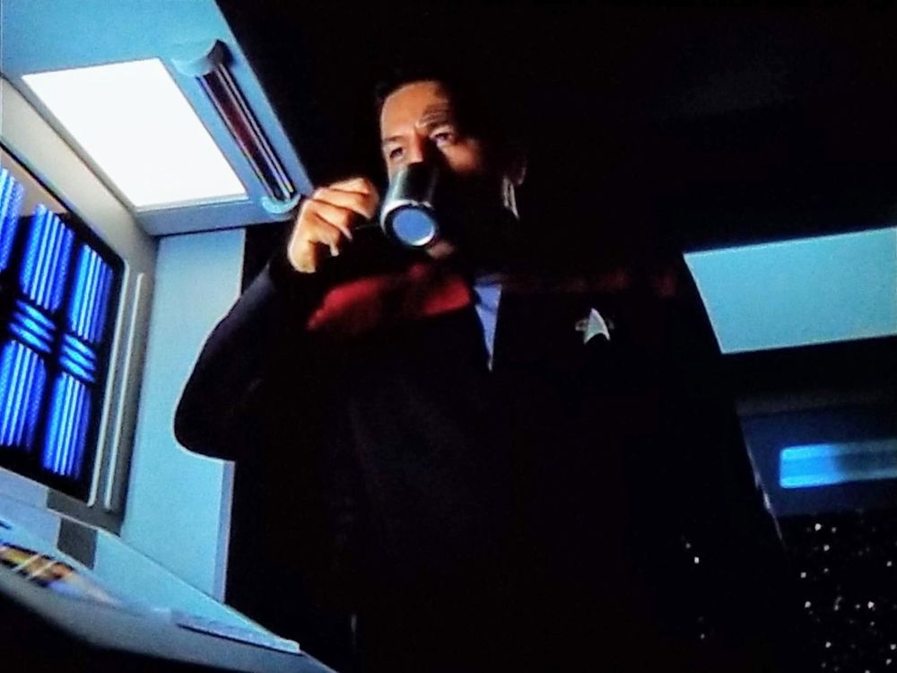 Star Trek Voyager scene. Picture one is Chakotay in uniform on ship, having a nice sip of coffee. Probably a Sunday morning, just getting his day started like a champ. Picture two is similar picture only now his whole body is illuminated like it's under an x-ray machine where you can see the inside parts like Bill Nye the Science Guy's body suite.  
Pic three is him in a state of shock, as if the coffee tasted really bad or was too hot or maybe he ordered a light roast but it's super heavy and acidic and whatever. He's just let go of the cup mid air.  Closed caption reads: (gasping)